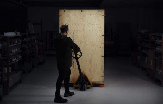 Man pulling GeoCore crate